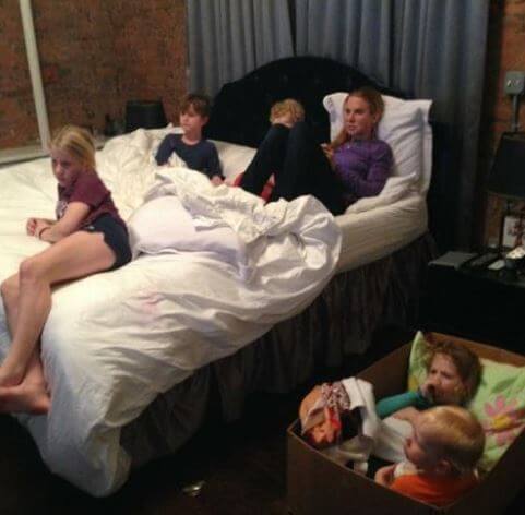 Marre Gaffigan with her mom and siblings watching TV.